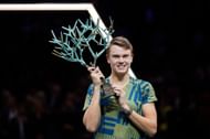Holger Rune poses with the 2022 Paris Masters trophy
